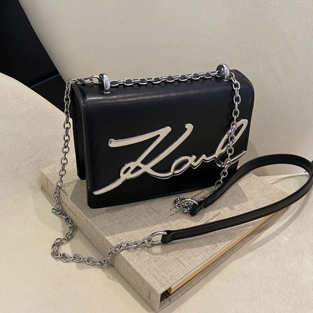 Fashionable Crossbody Bag.Metal Letter Logo ChainLink Strap. - Oreela